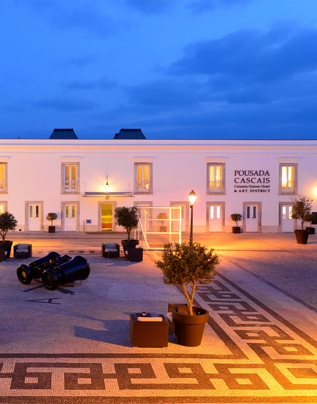 Pestana Cidadela Cascais — historic citadel hotel at dusk