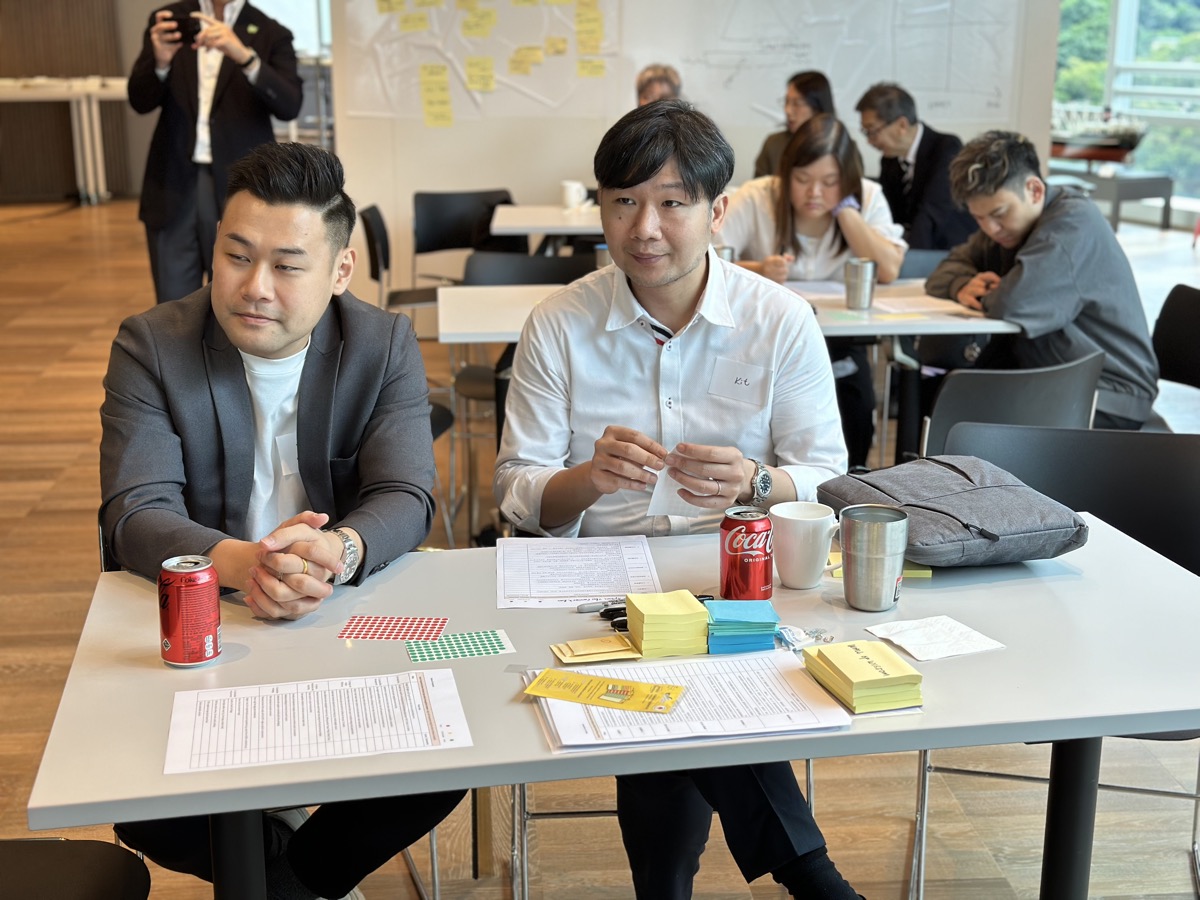 Participants in deep discussion during workshop
