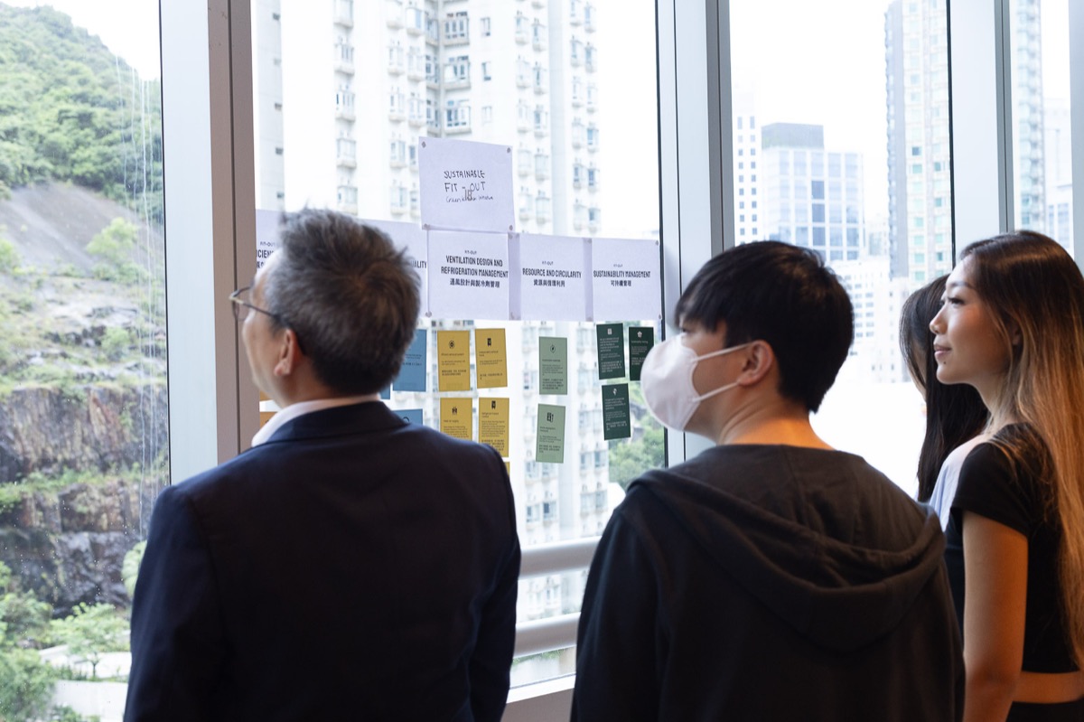 Participants brainstorming with sticky notes during workshop