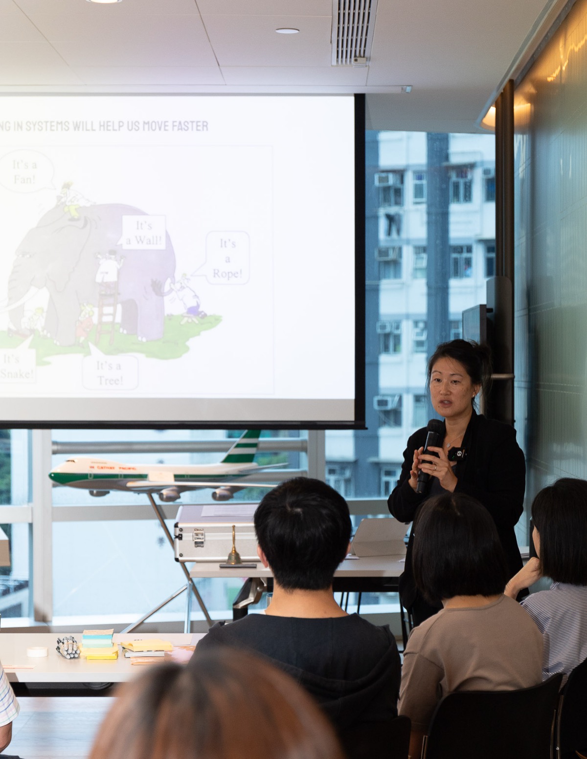 Heidi presenting at corporate workshop